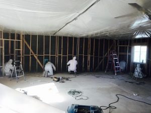 Technicians Conducting Mold Remediation In A Commercial Property